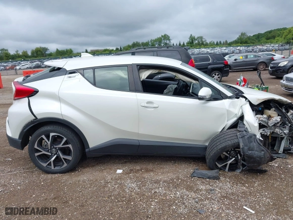2019 Toyota C-HR XLE with VIN JTNKHMBX4K1017377, listed as a IAAI auction lot 40049656 with 71,308 mi miles. Bid and sale history available at carsss.com. Image 13.