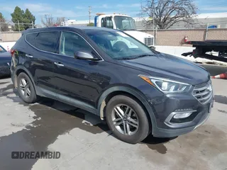 2017 Hyundai Santa Fe 2.4L z VIN 5XYZUDLB7HG469642, wystawiony jako IAAI lot #41706003 z przebiegiem 192 982 mil mil oraz . Historia ofert i sprzedaży dostępna na DreamBid. Obrazek 1.