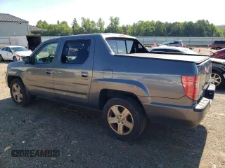 2011 Honda Ridgeline RTL with VIN 5FPYK1F51BB007802, listed as a Copart auction lot 63261935 with 397,803 mi miles and Clean title. Bid and sale history available at DreamBid. Image 2.