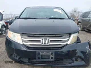 2012 Honda Odyssey EX-L with VIN 5FNRL5H63CB070361, listed as a IAAI auction lot 42025024 with 152,258 mi miles and . Bid and sale history available at carsss.com. Image 12.