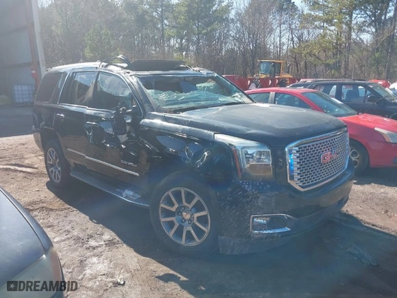 2016 GMC Yukon Denali with VIN 1GKS1CKJ2GR128618, listed as a IAAI auction lot 40009657 with 175,776 mi miles. Bid and sale history available at carsss.com. Image 1.