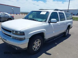 2003 Chevrolet Suburban LT z VIN 3GNFK16Z33G308805, wystawiony jako IAAI lot #42612393 z przebiegiem 205 213 mil mil oraz . Historia ofert i sprzedaży dostępna na DreamBid. Obrazek 2.