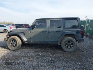 2019 Jeep Wrangler Unlimited Sport S with VIN 1C4HJXDG6KW578720, listed as a IAAI auction lot 42057153 with 65,719 mi miles and . Bid and sale history available at DreamBid. Image 14.