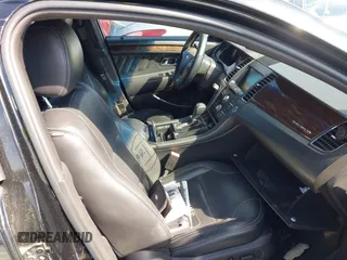 2013 Ford Taurus Limited z VIN 1FAHP2F81DG103292, wystawiony jako IAAI lot #42219104 z przebiegiem 86 085 mil mil oraz . Historia ofert i sprzedaży dostępna na DreamBid. Obrazek 5.