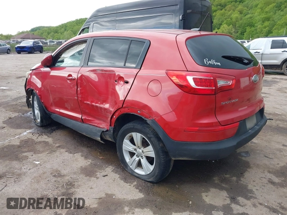 2012 Kia Sportage LX with VIN KNDPB3A23C7311640, listed as a IAAI auction lot 42258206 with 220,000 mi miles and . Bid and sale history available at DreamBid. Image 3.