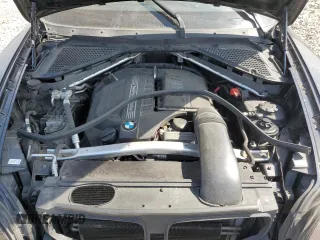 2012 BMW X5 35i with VIN 5UXZV4C54CL985119, listed as a Copart auction lot 56856735 with Not provided miles and Salvage title. Bid and sale history available at DreamBid. Image 12.