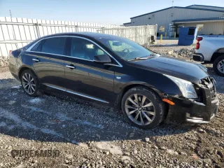 2017 Cadillac XTS with VIN 2G61L5S3XH9112938, listed as a Copart auction lot 87552835 with 126,291 mi miles and Salvage Title. Bid and sale history available at DreamBid. Image 4.
