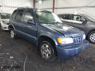 2002 Kia Sportage with VIN KNDJB723X25134499, listed as a IAAI auction lot 41273605 with 1 mi miles. Bid and sale history available at carsss.com. Image 1.