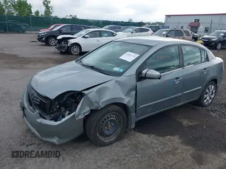 2010 Nissan Sentra S with VIN 3N1AB6AP9AL619216, listed as a IAAI auction lot 42607274 with 111,369 mi miles and . Bid and sale history available at DreamBid. Image 2.