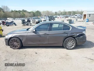 2013 BMW 3 Series 335i with VIN WBA3A9C51DF476537, listed as a IAAI auction lot 41900742 with 184,094 mi miles and . Bid and sale history available at DreamBid. Image 14.