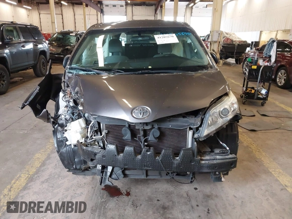 2015 Toyota Sienna L with VIN 5TDZK3DCXFS567507, listed as a IAAI auction lot 41205670 with 104,443 mi miles and . Bid and sale history available at DreamBid. Image 6.