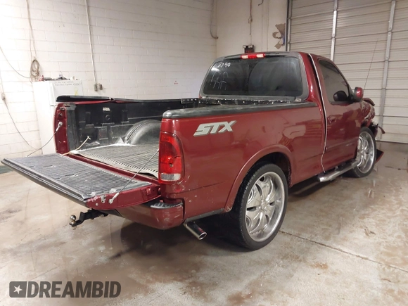 2003 Ford F-150 XL with VIN 2FTRF17243CA88390, listed as a IAAI auction lot 41387248 with Not provided miles and . Bid and sale history available at DreamBid. Image 4.