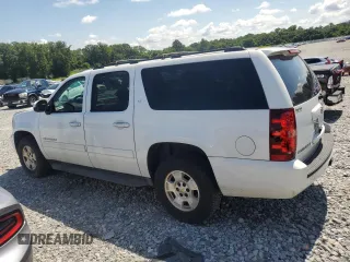2013 Chevrolet Suburban LT with VIN 1GNSCJE0XDR146798, listed as a Copart auction lot 62408525 with 218,484 mi miles and Salvage title. Bid and sale history available at DreamBid. Image 2.