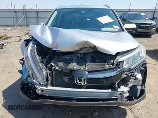 2015 Honda CR-V EX-L with VIN 2HKRM3H70FH552818, listed as a IAAI auction lot 41983061 with 202,898 mi miles and . Bid and sale history available at carsss.com. Image 6.