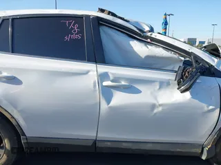 2018 Toyota RAV4 XLE with VIN 2T3WFREV3JW484955, listed as a IAAI auction lot 42262089 with 118,527 mi miles and . Bid and sale history available at DreamBid. Image 14.