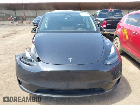 2024 Tesla Model Y Long Range with VIN 7SAYGAEE4RF078906, listed as a IAAI auction lot 42051207 with Not Provided miles and . Bid and sale history available at DreamBid. Image 11.