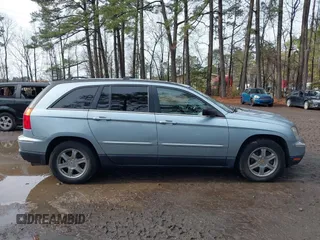 2004 Chrysler Pacifica z VIN 2C8GF68404R298454, wystawiony jako IAAI lot #41472118 z przebiegiem 136 176 mil mil oraz . Historia ofert i sprzedaży dostępna na DreamBid. Obrazek 13.