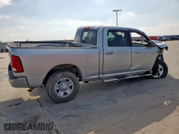 2014 Ram 2500 SLT with VIN 3C6TR5DT2EG205852, listed as a Copart auction lot 59514745 with 130,510 mi miles and Salvage title. Bid and sale history available at DreamBid. Image 3.