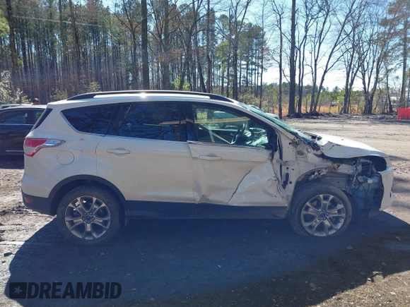 2016 Ford Escape SE with VIN 1FMCU0G9XGUB90670, listed as a IAAI auction lot 41694382 with 167,631 mi miles. Bid and sale history available at carsss.com. Image 13.