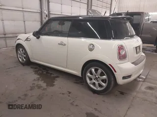 2010 MINI Hardtop S with VIN WMWMF7C50ATZ71884, listed as a IAAI auction lot 41731490 with 55,864 mi miles and . Bid and sale history available at DreamBid. Image 3.