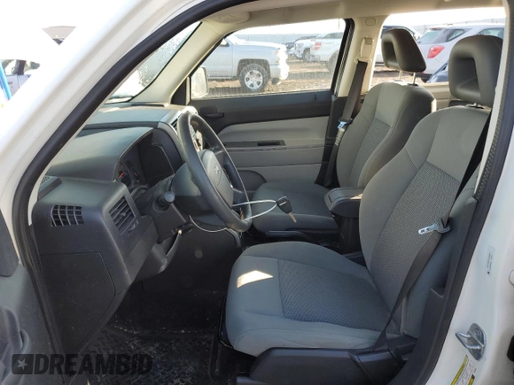 2007 Jeep Patriot Sport with VIN 1J8FF28WX7D355881, listed as a Copart auction lot 82766473 with 120,519 mi miles and Salvage Title. Bid and sale history available at DreamBid. Image 7.