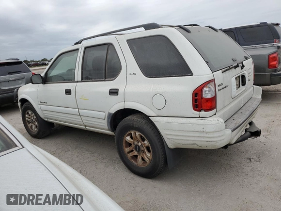 2002 Isuzu Rodeo S with VIN 4S2DM58W324327147, listed as a Copart auction lot 75194104 with Not Provided miles and Salvage Title. Bid and sale history available at DreamBid. Image 2.