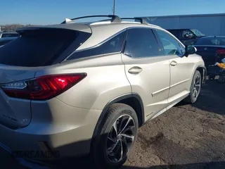 2017 Lexus RX with VIN 2T2BGMCA2HC013703, listed as a IAAI auction lot 41200592 with 134,403 mi miles. Bid and sale history available at carsss.com. Image 4.