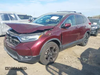 2018 Honda CR-V Touring with VIN 7FARW2H9XJE064414, listed as a IAAI auction lot 41904372 with 88,219 mi miles and . Bid and sale history available at DreamBid. Image 19.