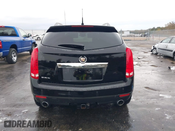 2011 Cadillac SRX Performance Collection with VIN 3GYFNBEYXBS597881, listed as a IAAI auction lot 41016643 with 164,781 mi miles and . Bid and sale history available at carsss.com. Image 16.