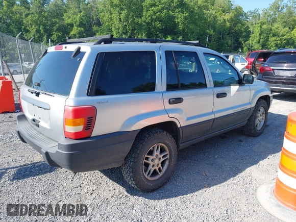 2004 Jeep Grand Cherokee Laredo with VIN 1J4GW48S84C116717, listed as a IAAI auction lot 42568586 with 228,233 mi miles and . Bid and sale history available at DreamBid. Image 4.