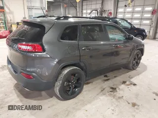 2016 Jeep Cherokee Latitude with VIN 1C4PJLCSXGW137190, listed as a IAAI auction lot 41563823 with 159,586 mi miles. Bid and sale history available at carsss.com. Image 4.