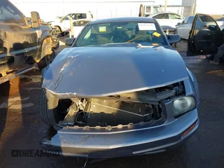 2007 Ford Mustang Deluxe z VIN 1ZVFT80N975302845, wystawiony jako IAAI lot #41615150 z przebiegiem Nie podano mil oraz . Historia ofert i sprzedaży dostępna na DreamBid. Obrazek 13.
