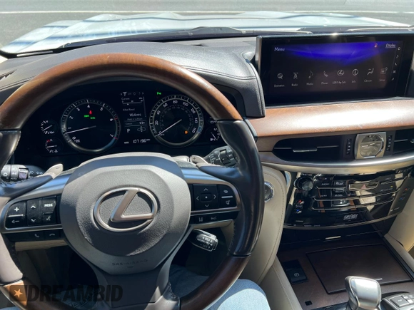 2016 Lexus LX 570 with VIN JTJHY7AX8G4198794, listed as a Copart auction lot 54615015 with 107,196 mi miles and Clean Title. Bid and sale history available at DreamBid. Image 7.