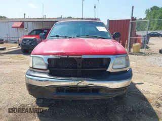 2000 Ford F-150 XL with VIN 1FTZX1724YNA42041, listed as a IAAI auction lot 42577102 with Not provided miles and . Bid and sale history available at DreamBid. Image 6.