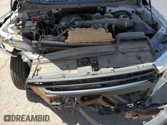2018 Ford F-150 XL with VIN 1FTEX1CB1JKC58165, listed as a Copart auction lot 61529075 with 105,771 mi miles and Salvage title. Bid and sale history available at DreamBid. Image 11.