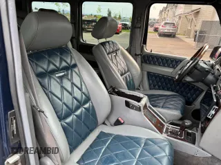 2003 Mercedes-Benz G 500 z VIN WDCYR49E73X137599, wystawiony jako Copart lot #56765315 z przebiegiem 157 409 mil mil oraz Tytuł czysty. Historia ofert i sprzedaży dostępna na DreamBid. Obrazek 5.