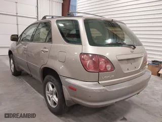 1999 Lexus RX 300 Luxury SUV with VIN JT6HF10U1X0013464, listed as a IAAI auction lot 42088616 with 254,653 mi miles. Bid and sale history available at carsss.com. Image 3.