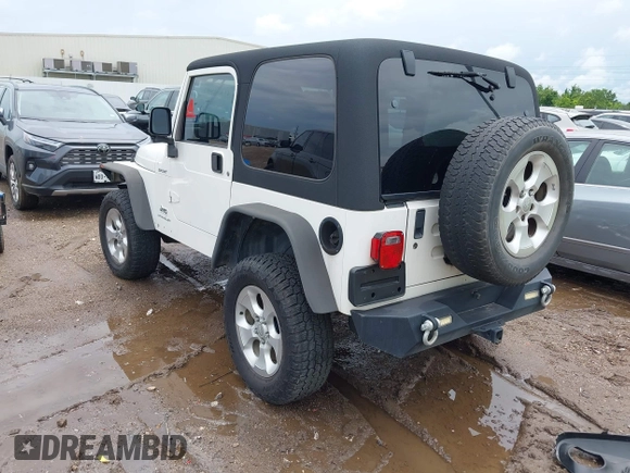 2003 Jeep Wrangler Sport with VIN 1J4FA49S43P362339, listed as a IAAI auction lot 41452901 with 208,128 mi miles and . Bid and sale history available at DreamBid. Image 3.