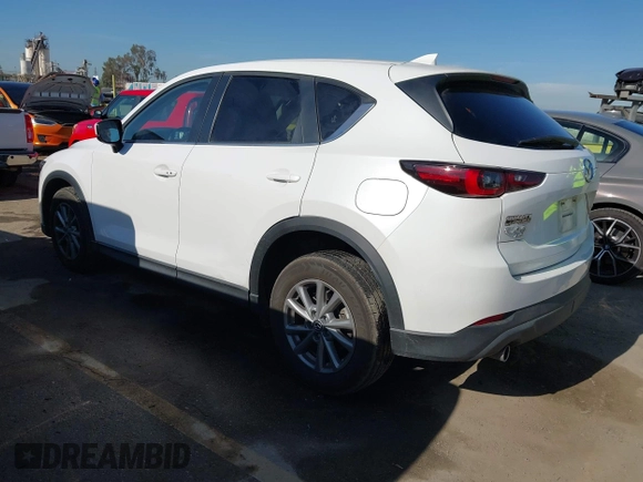 2022 Mazda CX-5 S Preferred with VIN JM3KFBCM2N0630148, listed as a IAAI auction lot 41986351 with 45,664 mi miles and . Bid and sale history available at carsss.com. Image 3.
