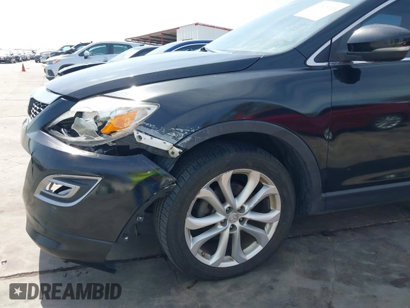 2011 Mazda CX-9 Grand Touring with VIN JM3TB3DA5B0300784, listed as a IAAI auction lot 41816110 with 138,523 mi miles and . Bid and sale history available at DreamBid. Image 18.