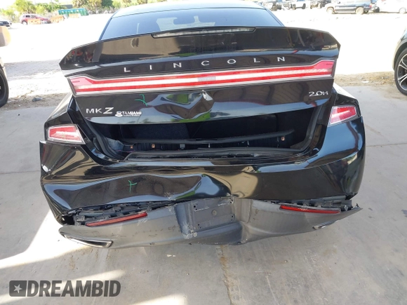 2014 Lincoln MKZ Hybrid z VIN 3LN6L2LU5ER831041, wystawiony jako IAAI lot #42447895 z przebiegiem 92 102 mil mil oraz . Historia ofert i sprzedaży dostępna na DreamBid. Obrazek 6.