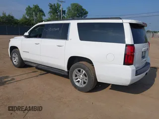2020 Chevrolet Suburban LT z VIN 1GNSKHKC9LR198576, wystawiony jako IAAI lot #42498041 z przebiegiem 81 668 mil mil oraz . Historia ofert i sprzedaży dostępna na DreamBid. Obrazek 3.