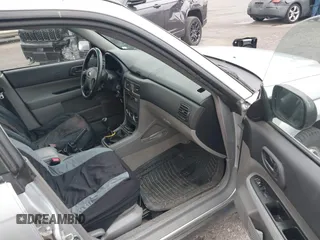 2003 Subaru Forester X with VIN JF1SG63633G728520, listed as a IAAI auction lot 41808658 with 104,084 mi miles. Bid and sale history available at carsss.com. Image 5.