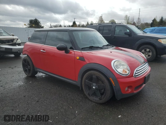 2009 MINI Hardtop with VIN WMWMF33509TU73771, listed as a Copart auction lot 51156025 with 119,622 mi miles and Salvage Title. Bid and sale history available at DreamBid. Image 4.