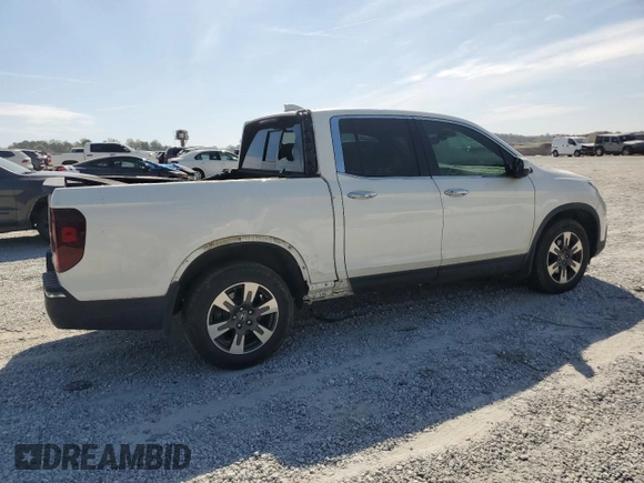 2019 Honda Ridgeline RTL-E with VIN 5FPYK3F72KB021673, listed as a Copart auction lot 50599005 with 65,469 mi miles and Salvage title. Bid and sale history available at DreamBid. Image 3.