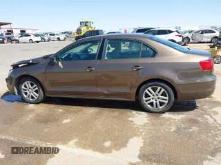 2014 Volkswagen Jetta S with VIN 3VW2K7AJ8EM319182, listed as a IAAI auction lot 42180101 with 133,495 mi miles and . Bid and sale history available at DreamBid. Image 14.