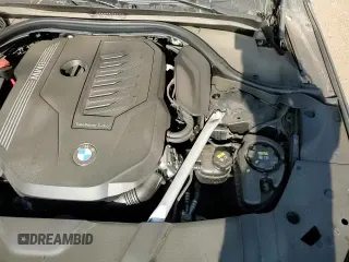 2022 BMW 7 Series 740i xDrive with VIN WBA7T4C02NCH98385, listed as a Copart auction lot 71987175 with 23,985 mi miles and Salvage title. Bid and sale history available at DreamBid. Image 13.