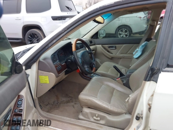 2002 Subaru Legacy Outback VDC with VIN 4S3BH896827655881, listed as a IAAI auction lot 41498930 with 219,672 mi miles and . Bid and sale history available at DreamBid. Image 5.