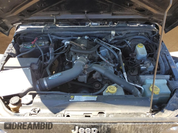2007 Jeep Wrangler Sahara z VIN 1J4FA54177L183617, wystawiony jako Copart lot #49660785 z przebiegiem 178 846 mil mil oraz Szkoda całkowita • Salvage title. Historia ofert i sprzedaży dostępna na DreamBid. Obrazek 11.