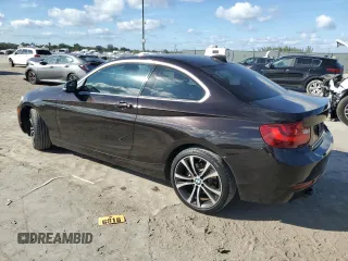 2015 BMW 2 Series 228i xDrive with VIN WBA1F7C51FVX95782, listed as a Copart auction lot 44176475 with 67,809 mi miles and Salvage Title. Bid and sale history available at carsss.com. Image 2.